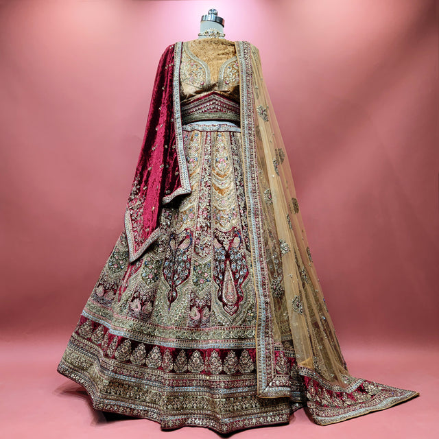 Maroon velvet bridal lehenga with gold zari embroidery and double dupattas, full length