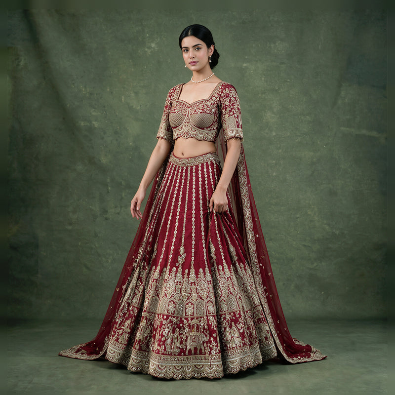 Amrapali - Maroon Raw Silk Elephant Procession Bridal Lehenga with Double Net Dupatta