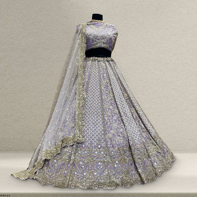 Lavender georgette lehenga with gold embroidery and flared skirt, sheer dupatta