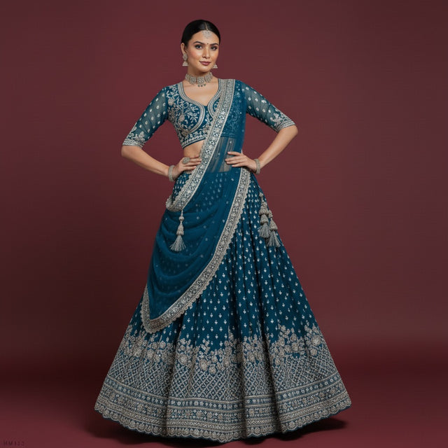 Peacock blue lehenga with silver embroidery, flared skirt and matching dupatta