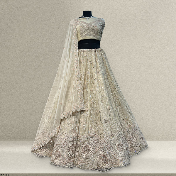 Cherry Blossom - Ivory Reception Engagement Lehenga With Designer Blouse