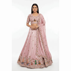 Baby pink designer lehenga with embroidered blouse and floral motif skirt