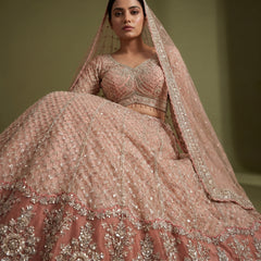 Peach pearl and cutdana embellished lehenga with matching dupatta, full look
