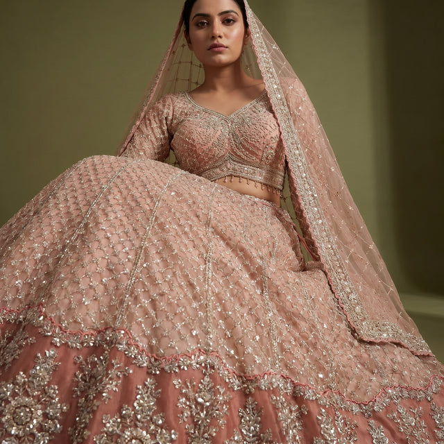 Peach pearl and cutdana embellished lehenga with matching dupatta, full look