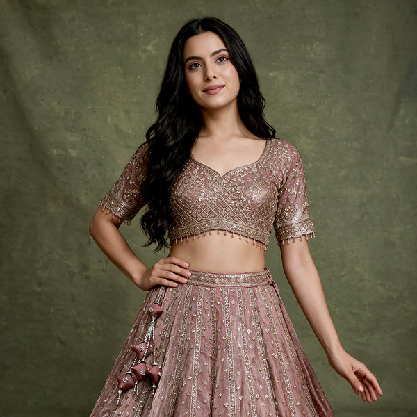 Mauve embroidered lehenga blouse with scalloped sleeves and flared skirt, beadwork