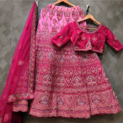 Pink embellished lehenga skirt with matching blouse and net dupatta