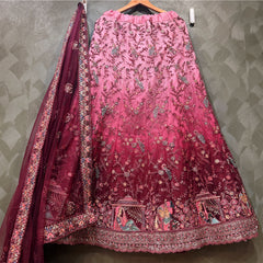Embroidered pink maroon lehenga skirt with ornate hem border and allover motifs