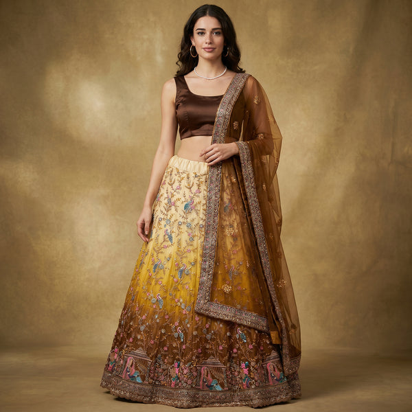 Mehendi lehenga with gold threadwork floral skirt, sleeveless blouse and net dupatta