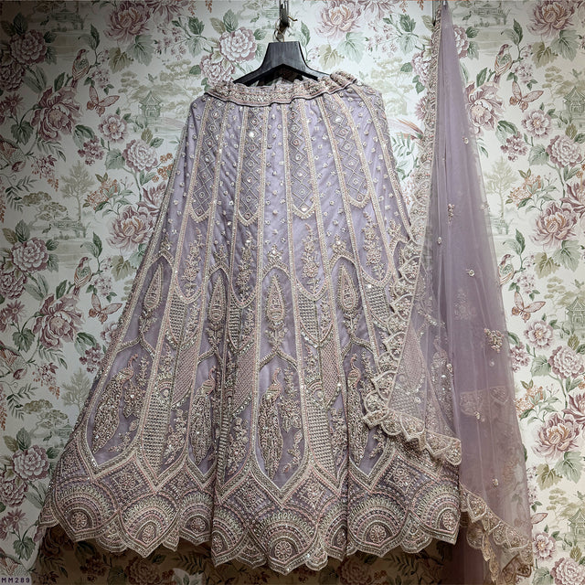 Lavender embroidered lehenga with vertical motif panels and matching dupatta veil