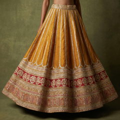 Royal Baggi Collection: Champagne Gold Raw Silk Embroidered Designer Lehenga - JMS Studio