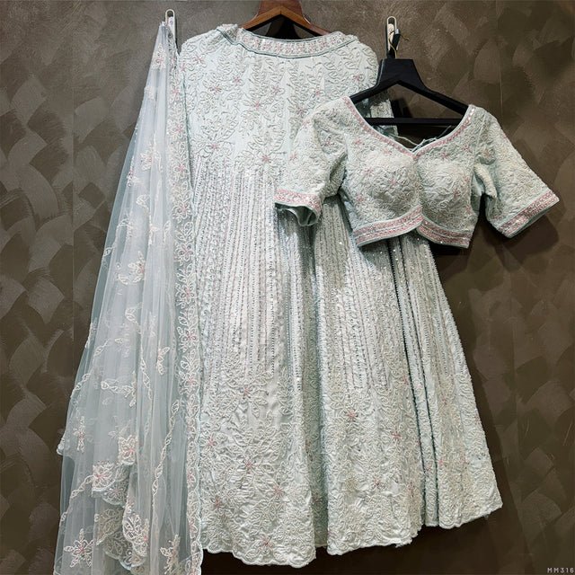 Powder blue embroidered lehenga with short sleeves and matching net dupatta
