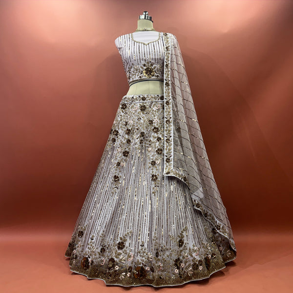Lavender sequin lehenga with floral motifs and net dupatta