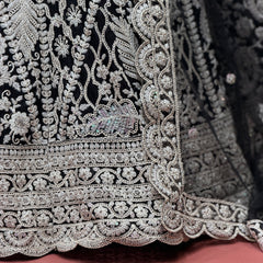 Silver embroidered skirt panel with dense jaal pattern and scalloped hem border