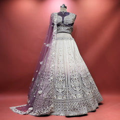 Lavender velvet lehenga with silver embroidery and matching sheer dupatta
