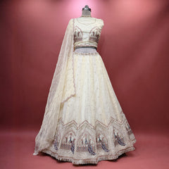 Ivory tissue silk lehenga skirt with sheer overlay and ornate peacock motif hem embroidery