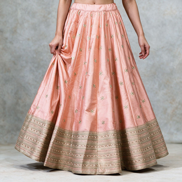 Peach lehenga skirt with gold border and allover butti motifs