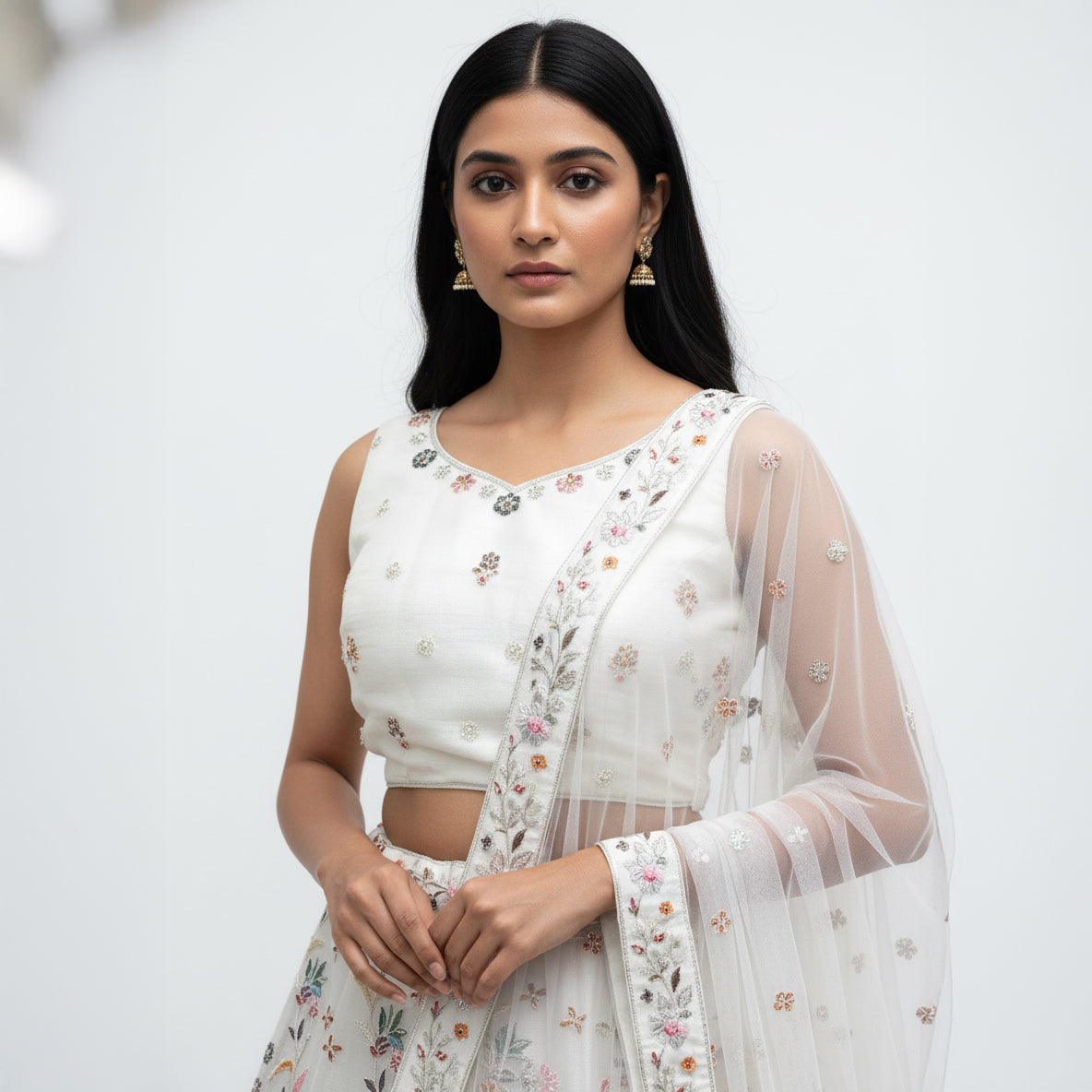 Aisha - Soft Net Threadwork White Partywear Lehenga