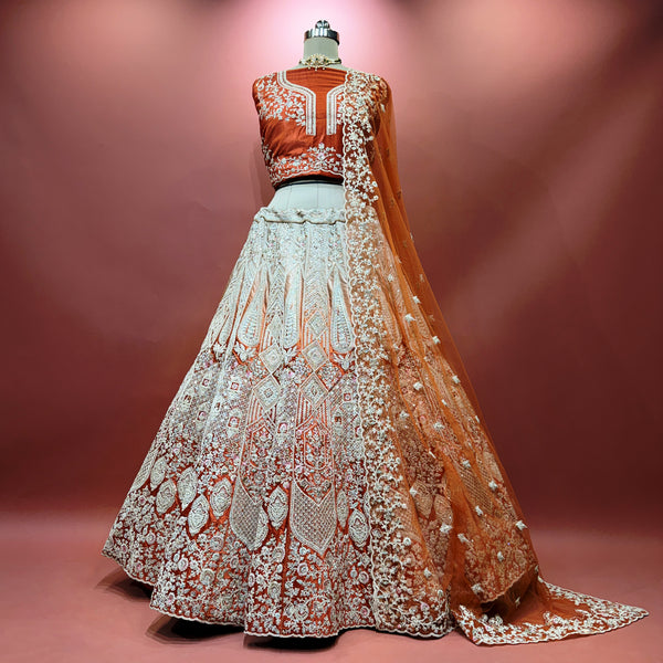 Paisley embroidered lehenga skirt, teal with burnt-orange velvet border and zari trim
