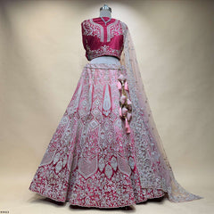 Pink and magenta embroidered lehenga skirt with matching blouse and sheer dupatta