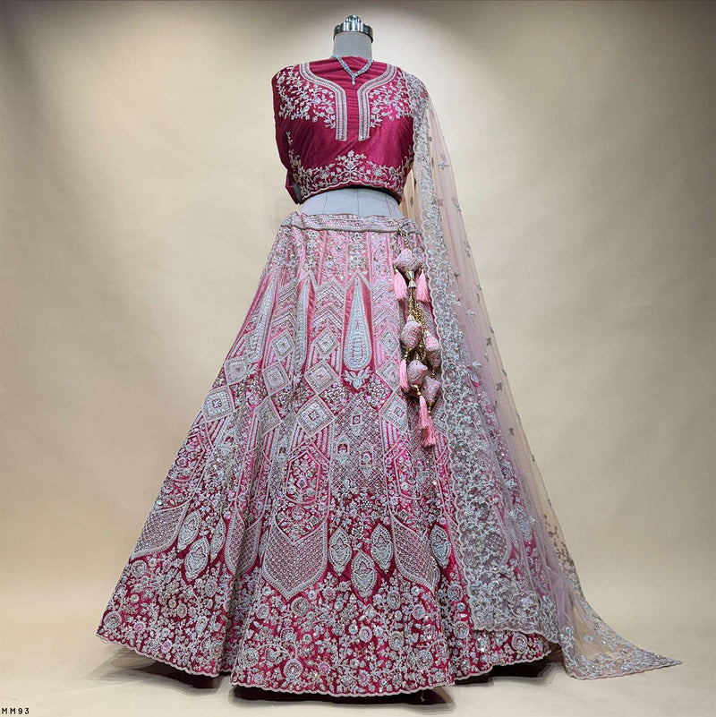 Pink and magenta embroidered lehenga skirt with matching blouse and sheer dupatta