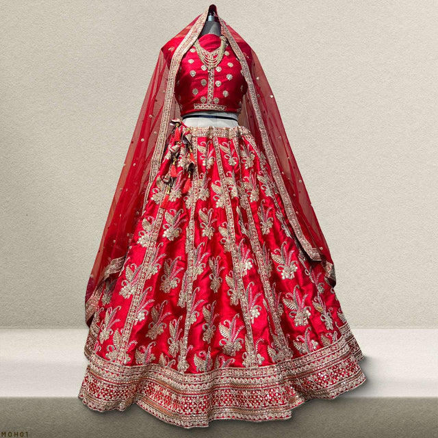Red bridal lehenga set with gold threadwork, scalloped neckline and full flared skirt