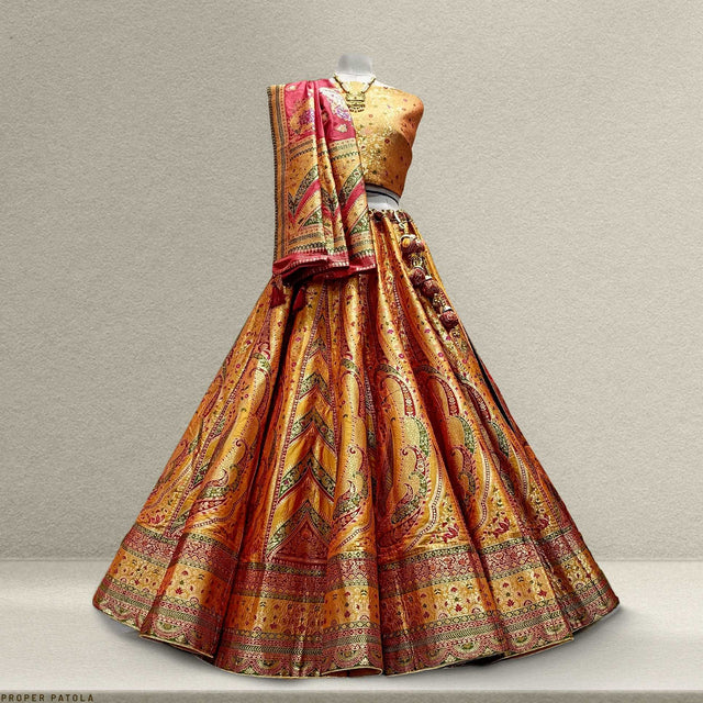 Flared lehenga with sleeveless blouse and draped dupatta, multicolor paisley print