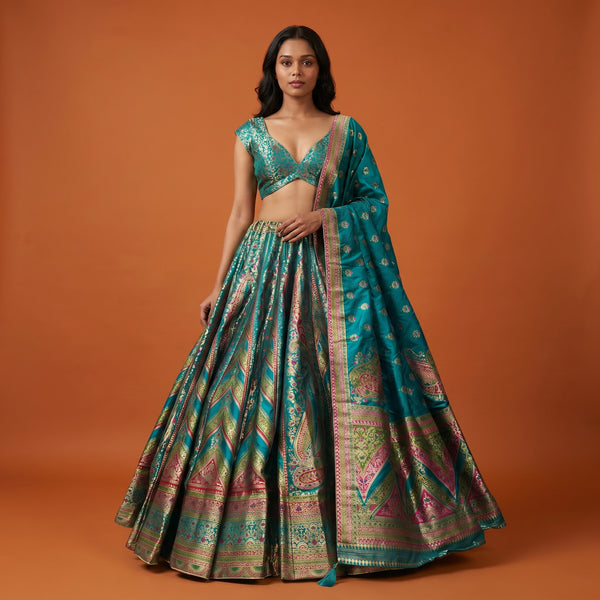 Rama green Banarasi silk flared lehenga with multicolor geometric motifs and dupatta