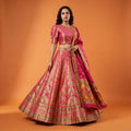 Varnali pink patterned Banarasi silk flared lehenga with short-sleeve blouse and dupatta