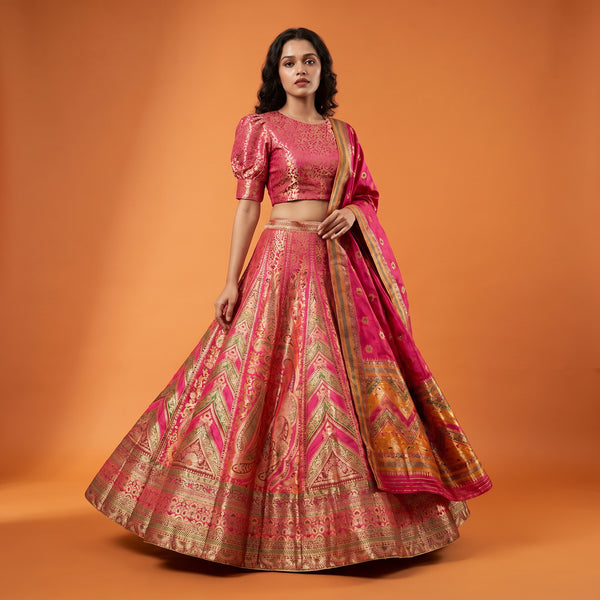 Varnali pink patterned Banarasi silk flared lehenga with short-sleeve blouse and dupatta