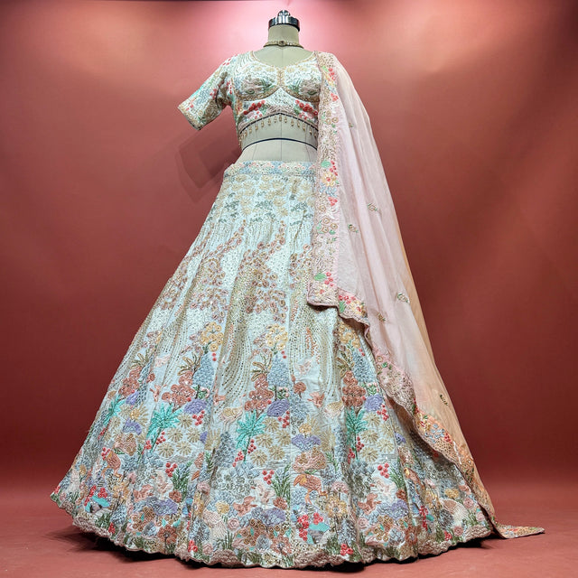 Off-white embroidered lehenga skirt with floral resham and zari work, paired dupatta