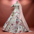 Ivory flared lehenga with multicolour moti and resham embroidery, sheer dupatta