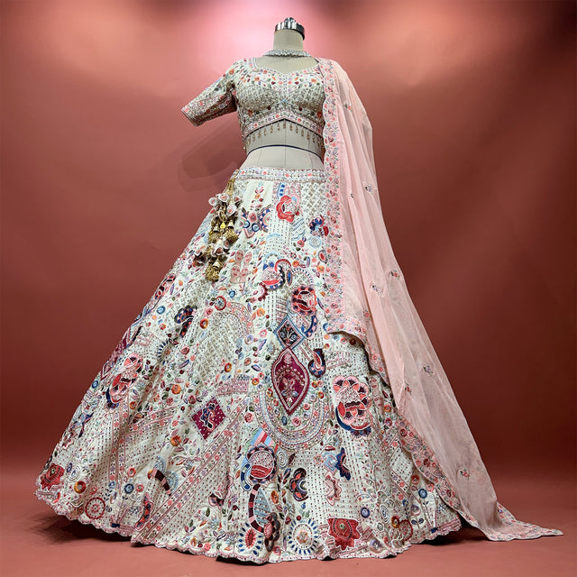 Ivory flared lehenga with multicolour moti and resham embroidery, sheer dupatta