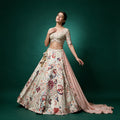 Ivory raw silk lehenga set with multicolour embroidered motifs, flared skirt and dupatta