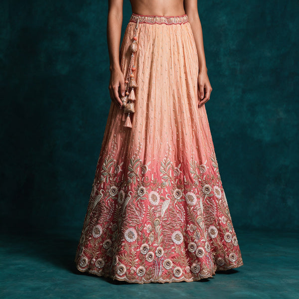 Peach coral ombre embroidered lehenga skirt with ornate floral border