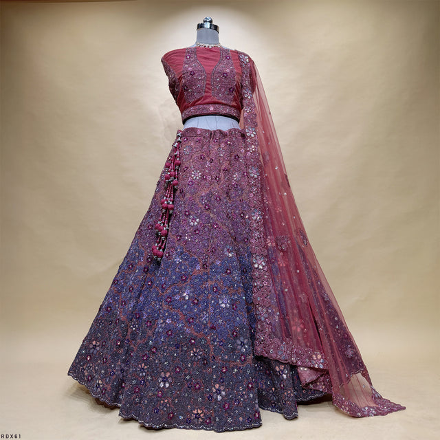 Pink-to-purple sequin lehenga with embroidered cape dupatta drape and flared skirt