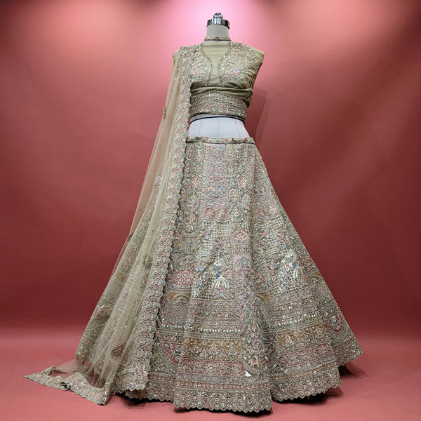 Sage green embroidered lehenga skirt with ornate border and full flare