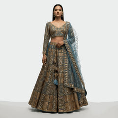 Teal and gold patterned lehenga with sequin blouse and sheer embellished dupatta