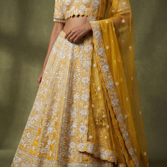 Damsel: Butter Yellow Raw Silk Mirror Handwork Lehenga