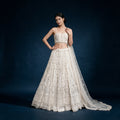 Off-white embellished georgette lehenga with tiered skirt and draped dupatta