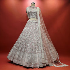 Lavender sequined lehenga skirt with beaded floral motifs and sheer dupatta