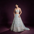Sky blue embellished lehenga with sequin choli and floral patterned skirt