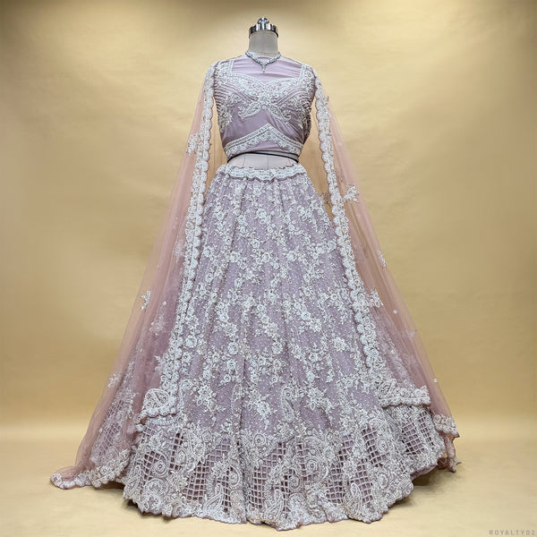 Lavender embroidered lehenga skirt with sheer drape and lace border, on mannequin