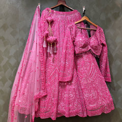 Shocking pink sequined lehenga outfit set: blouse, flared skirt, sheer dupatta