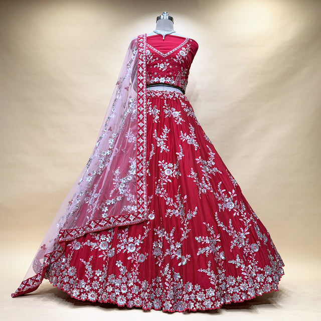 Designer lehenga in deep pink-maroon with silver zari floral embroidery and sheer dupatta