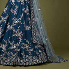 Blue lehenga skirt with silver zari floral border and draped sheer dupatta