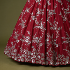 Rani pink silk lehenga skirt with dense silver zari floral pattern