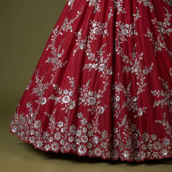 Rani pink silk lehenga skirt with dense silver zari floral pattern