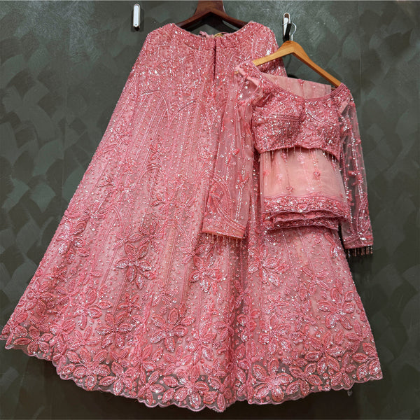 Baby pink embroidered lehenga with bead-and-pearl sparkle, flared skirt and blouse