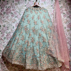 Teal-blue lehenga skirt with floral resham and cutdana details, pink sheer dupatta