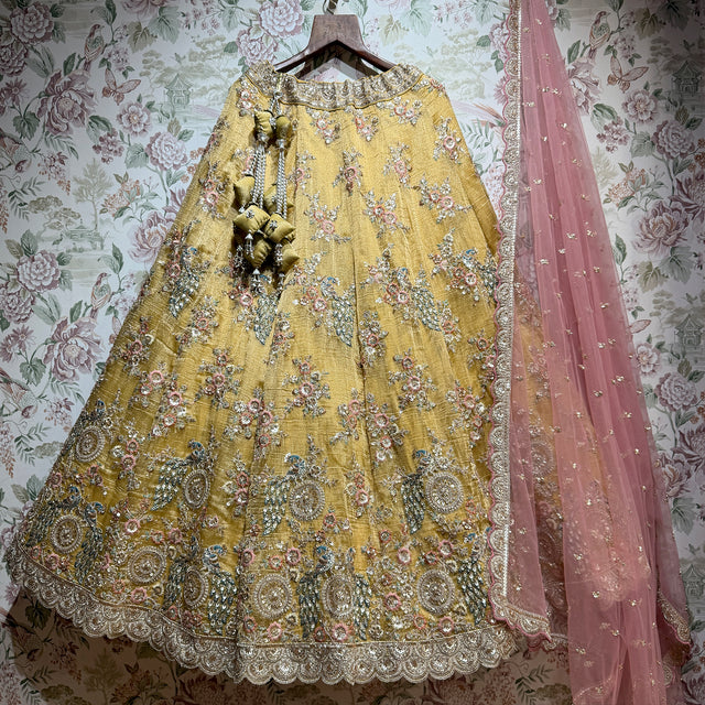 Yellow embroidered lehenga with floral resham and cutdana, plus sheer pink dupatta